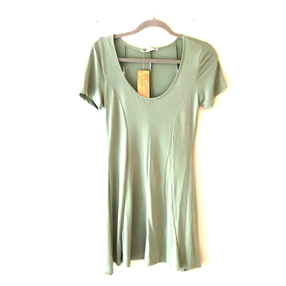 Sage green Dress from Franchescas. Tags on.